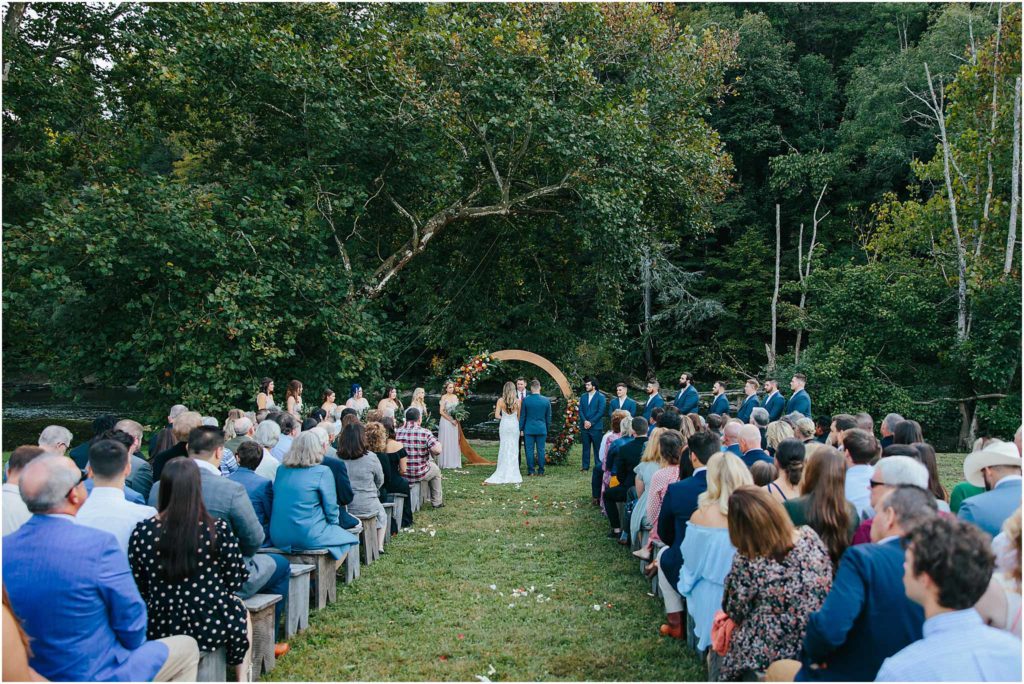 Wide angle of wedding ceremony taken at crooked river wedding venue
