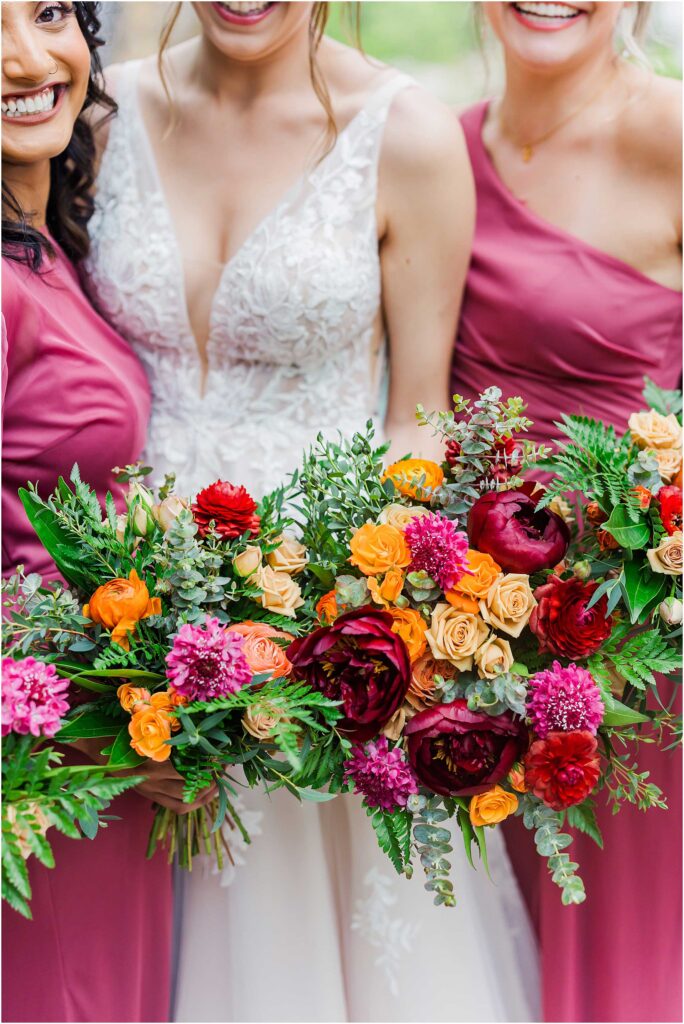 Focus on bridal bouquet at waterstone venue wedding