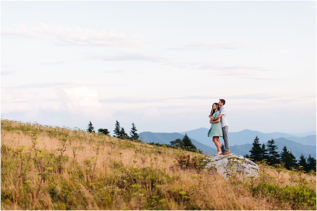  Beautiful engagement session standing on rock glancing at Carvers Gap in Roan Mountain TN