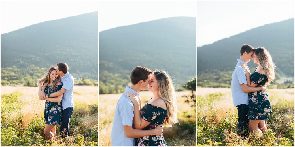 Wedding photographer captures photos of couple at engagement session with Carvers Gap in the distance