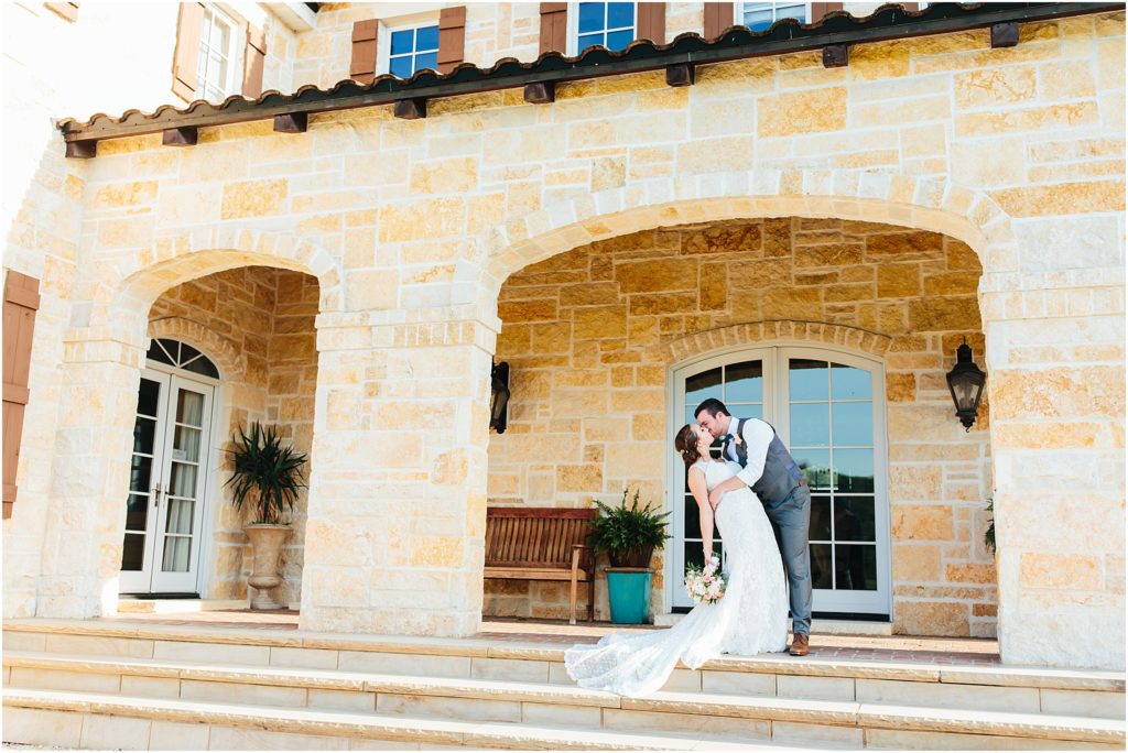Villa Nove Vineyards Wedding photo dip kissing bride and groom
