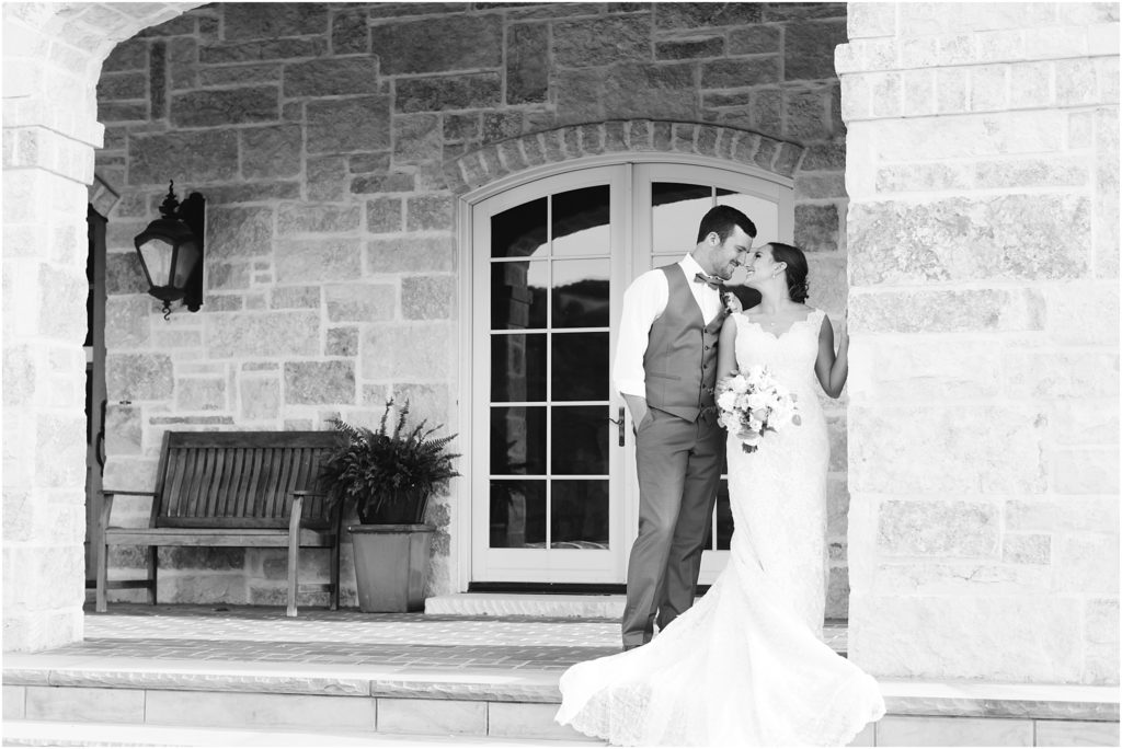 Black and white bride and groom at Italian themed wedding venue in Butler Tennessee wedding photographer