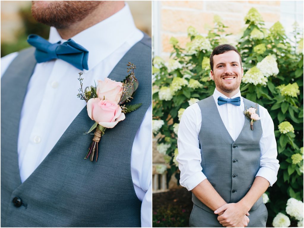 Groom smiling on his wedding day with flowers in the background in Butler TN Villa Nove Vineyards wedding venue