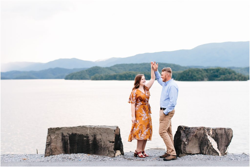 bristol tennessee engaged couple dancing at south holston dam