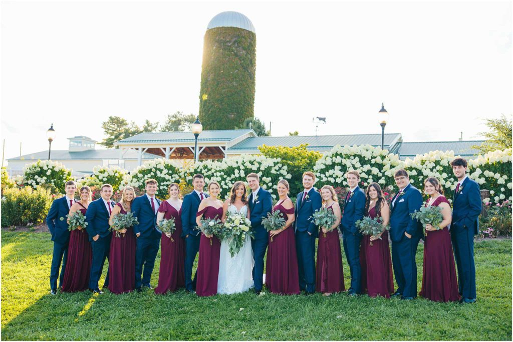 Barn silo in background of bridal party. Sinkland farms wedding venue in Christiansburg VA  