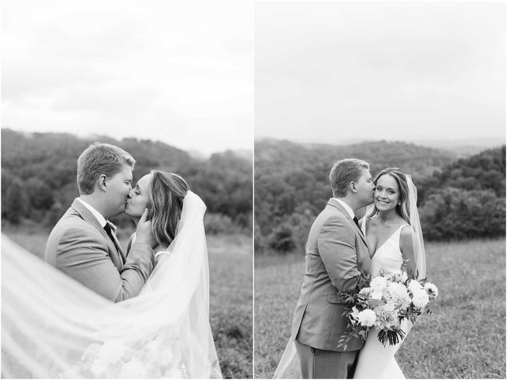 Bride and groom kiss and look towards camera in a black and white photo. Taken at Chateau Selah venue
