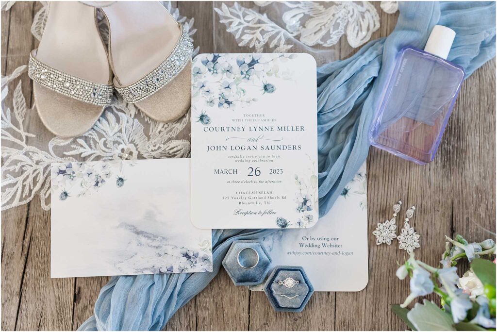 Invitation suite with bridal details at blountville wedding venue 