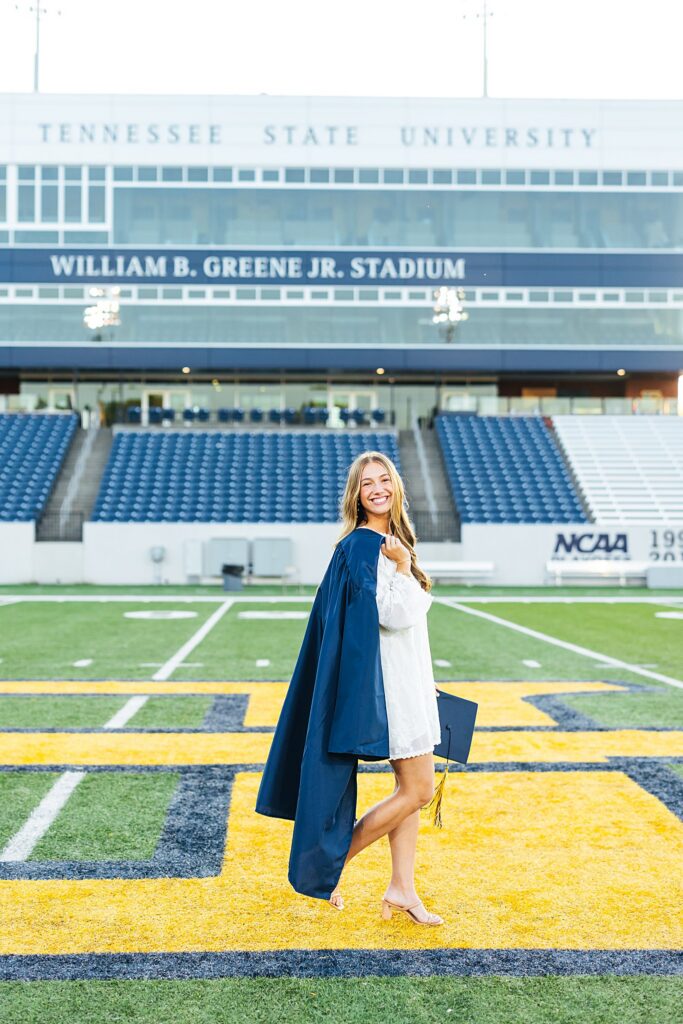 Emily’s ETSU graduation photos on the football field at East Tennessee State University in Johnson City, Tennessee